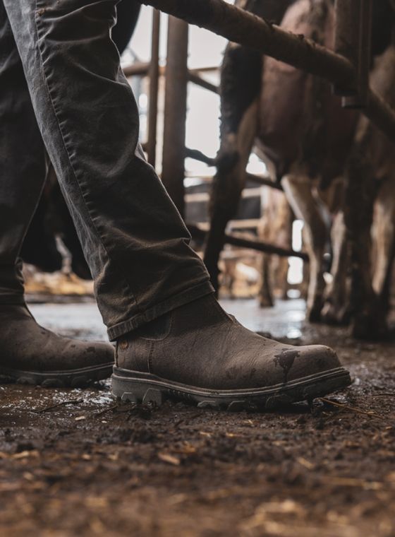 a person wearing dirty boots